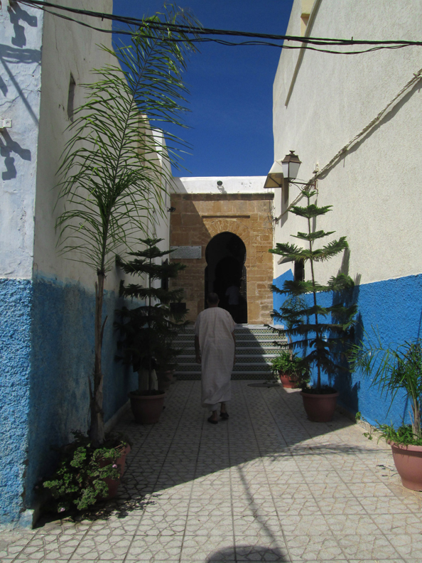 A man  Inside Kasbah Des Oudayas in Rabat Morocco