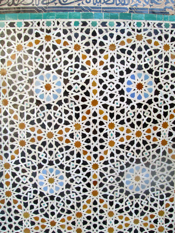 Zellige tiles on the walls of the Medersa Bou Inania in Fes Morocco