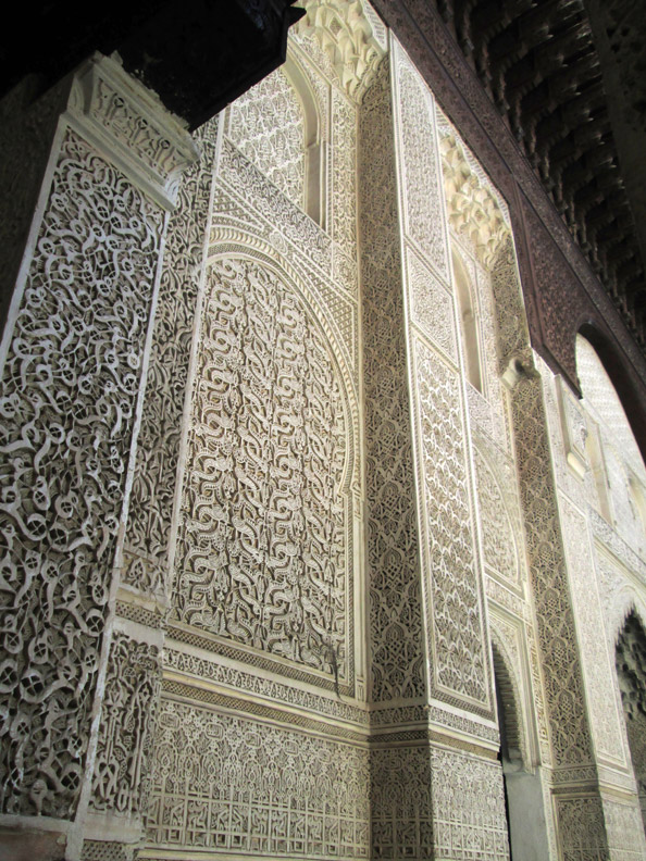 Arabesque designs on a wall of Madrasa Bou Inania in Meknes Morocco