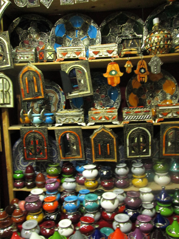 Hamsas and other items for sale in the souks of Fes Morocco