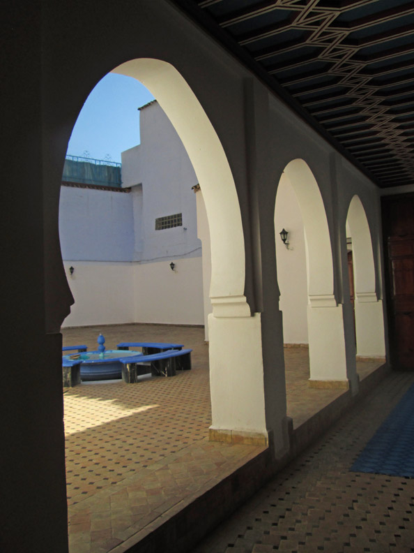 Peeking into the mosque in Chefchaouen Morocco