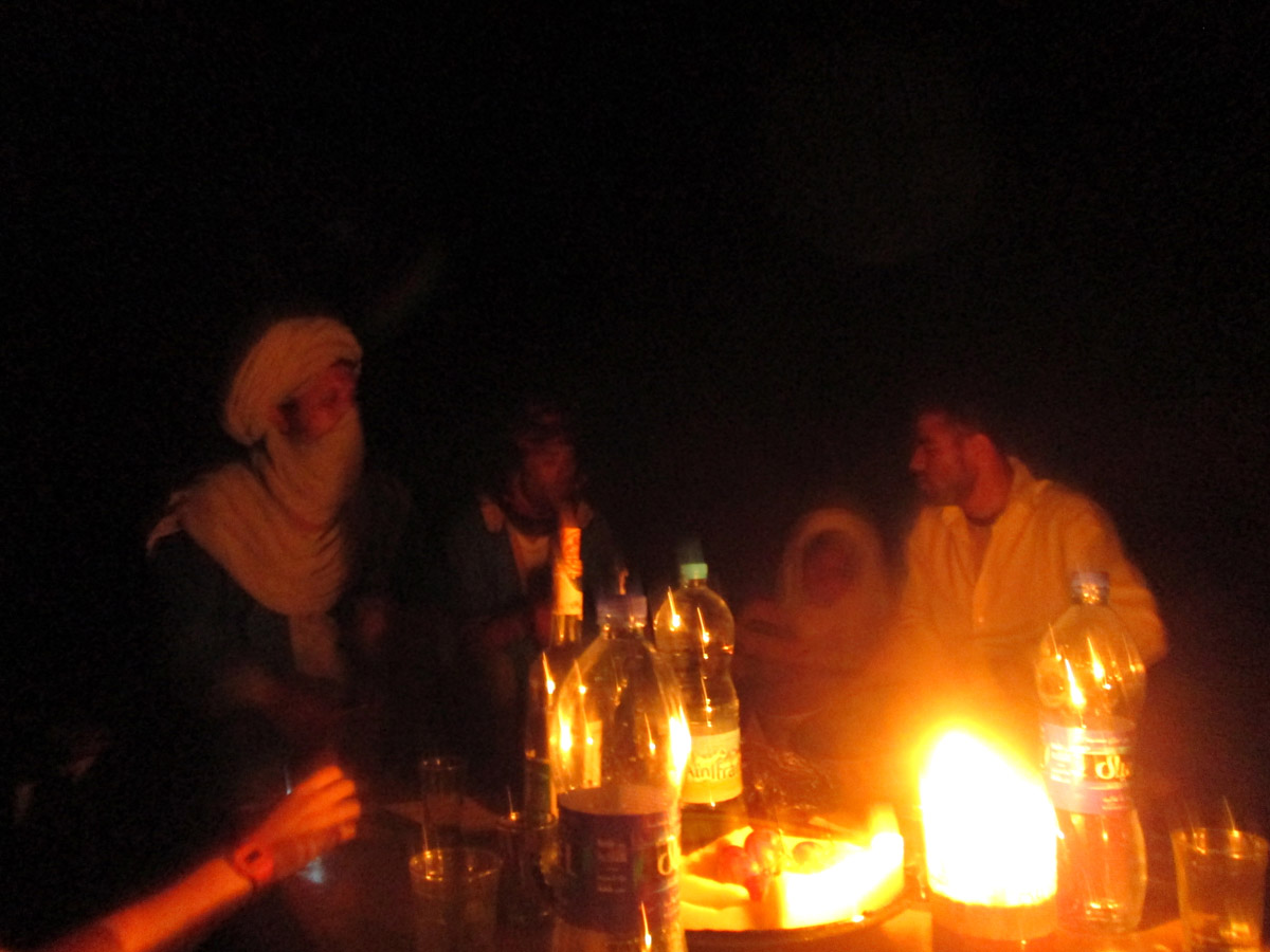 Sitting around the table for dinner in the Sahara Desert near Merzouga, morocco