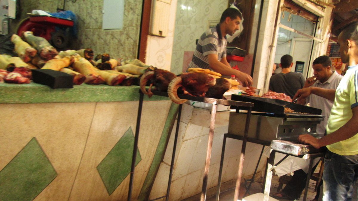 A meat seller in the souks of Fes Morocco