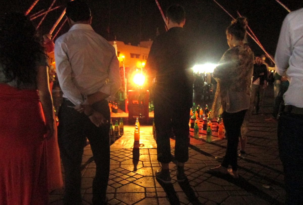 People playing a game at Jemaa El Fna in Marrakesh Morocco