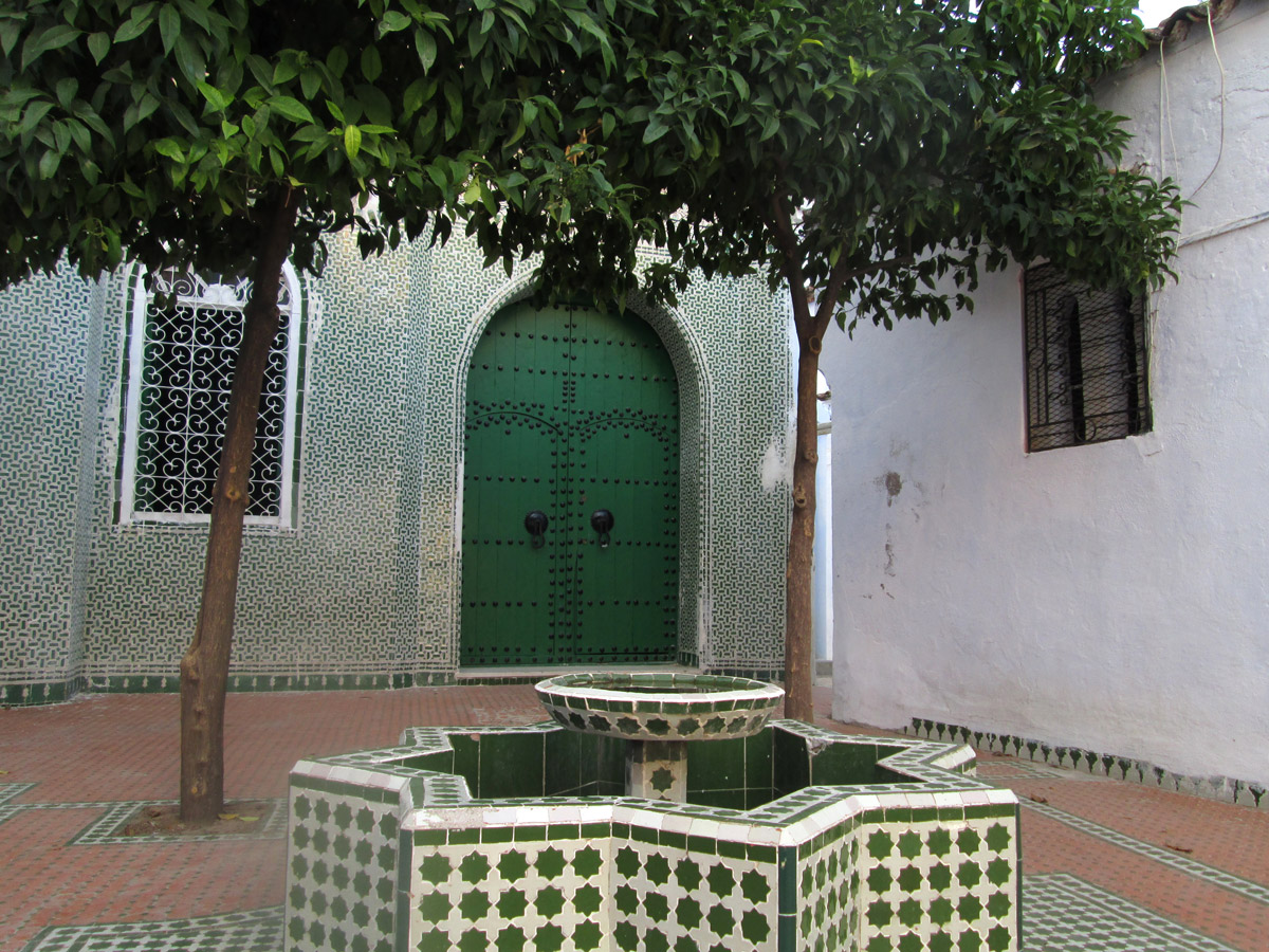 Zellige tiles and fountain outside the mosque in Chefchaouen Morocco